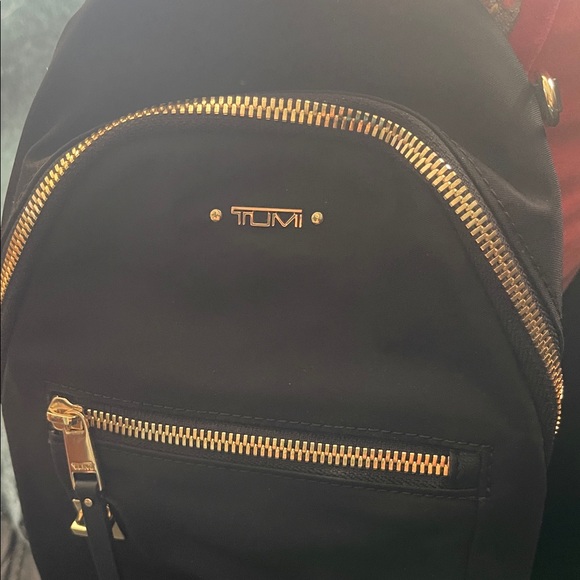 Tumi Black Nylon Sling Bag with Gold Zippers - Picture 2 of 5